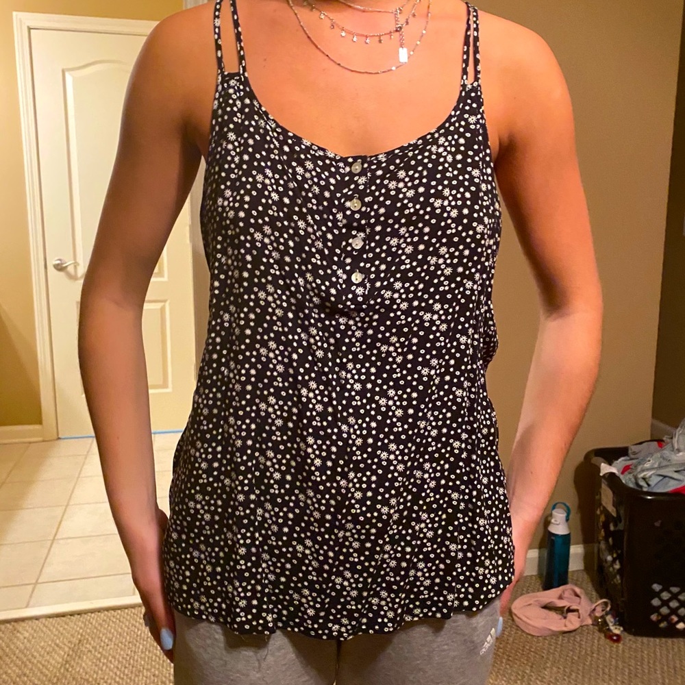 black tank top with white flower detailing